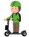ヘルメットを着用してキックボードに乗る画像